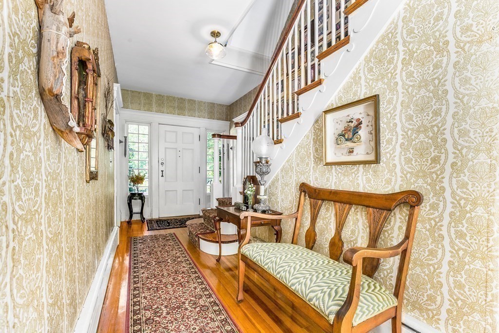 216 Spring Street Marshfield, MA 02050 - Photo 21 of 36 a living room with furniture and a rug