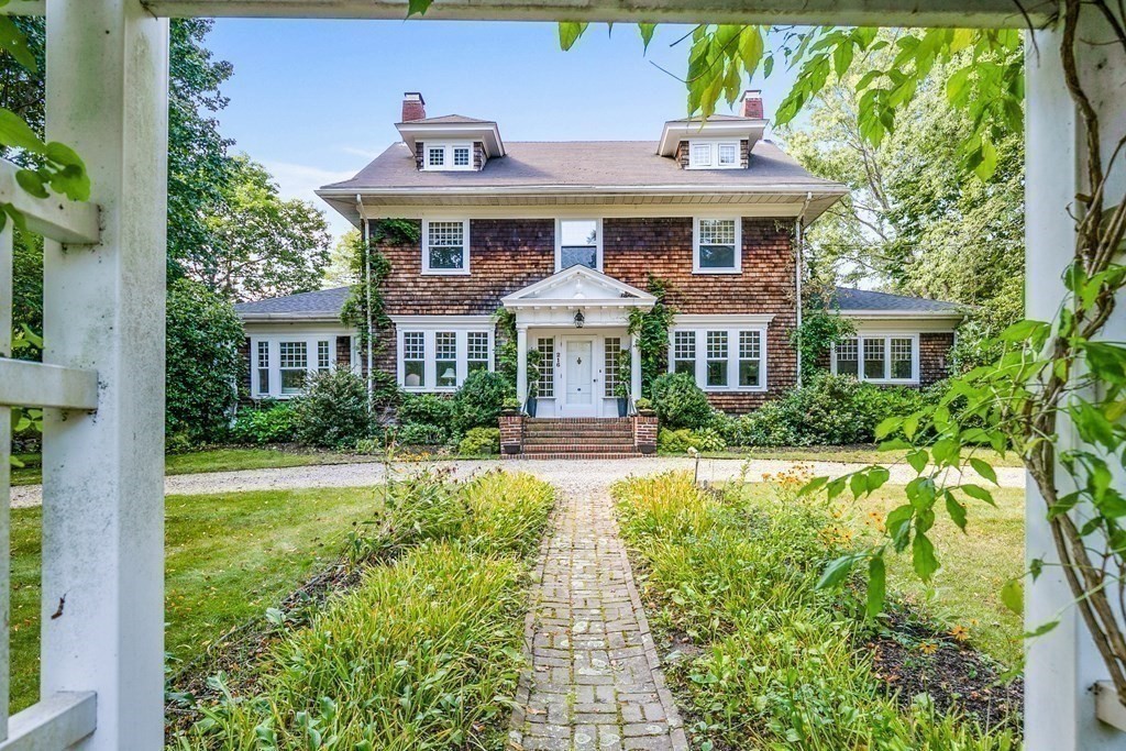 216 Spring Street Marshfield, MA 02050 - Photo 3 of 36 a front view of a house with a yard