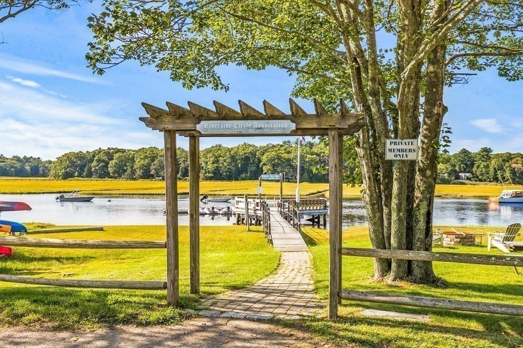 216 Spring Street Marshfield, MA 02050 - Photo 31 of 36 a view of a swimming pool with an ocean view