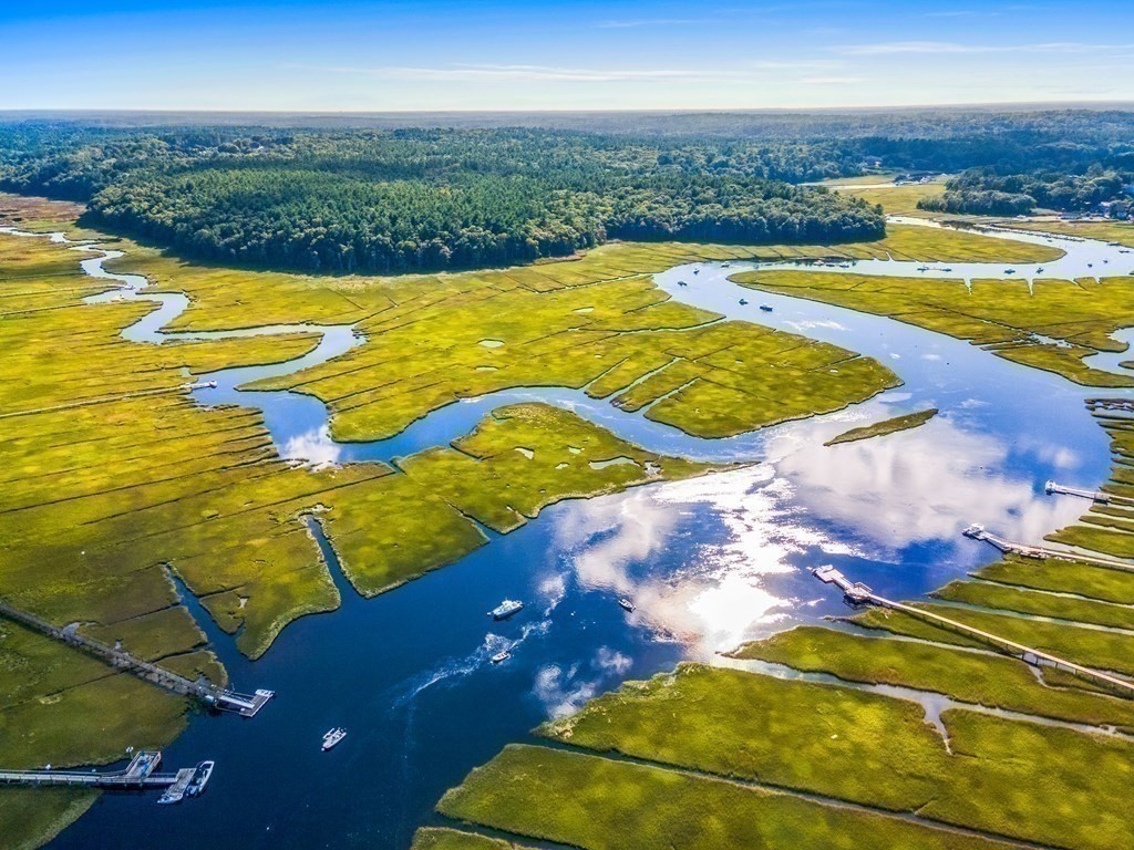 216 Spring Street Marshfield, MA 02050 - Photo 33 of 36 a view of an ocean and beach