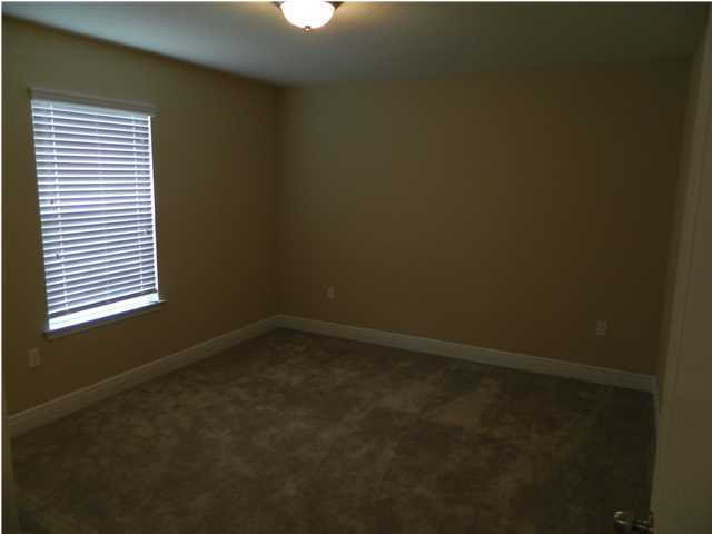 4611 Hermosa Road Crestview, FL 32539 - Photo 12 of 19 an empty room with a window