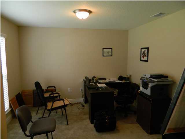 4611 Hermosa Road Crestview, FL 32539 - Photo 3 of 19 a view of a workspace with furniture