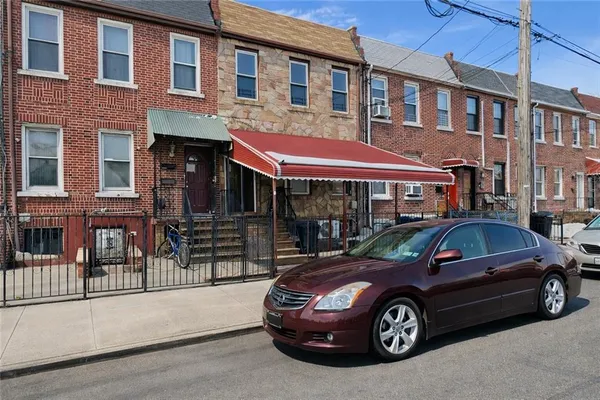 a car parked in front of a building