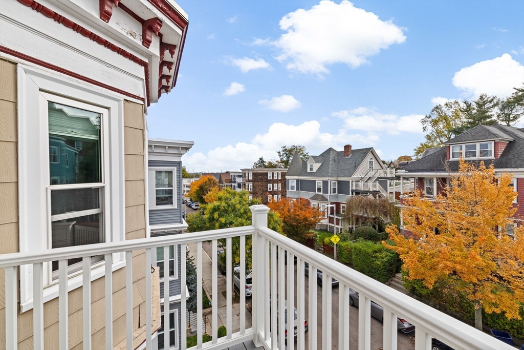 108 King Street, Unit THREE Boston, MA 02122 - Photo 2 of 18 a view of a balcony with city view