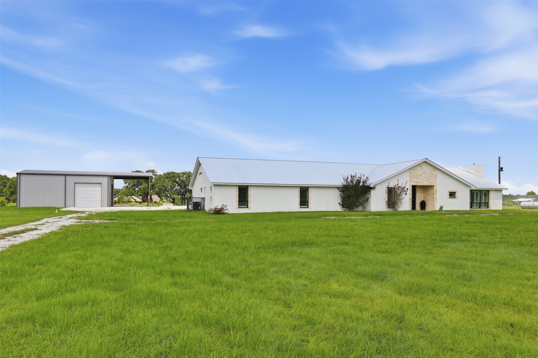 1589 County Road 252 Anderson, TX 77830 - Photo 2 of 50 a view of a big yard in front of a house