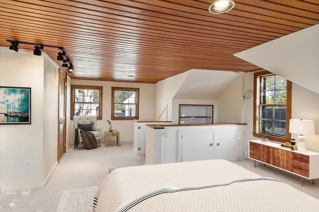 a front view of a building with a yard