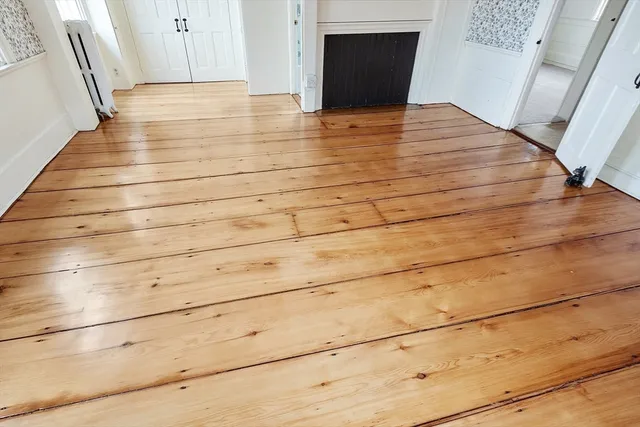 a view of wooden floor and staircase