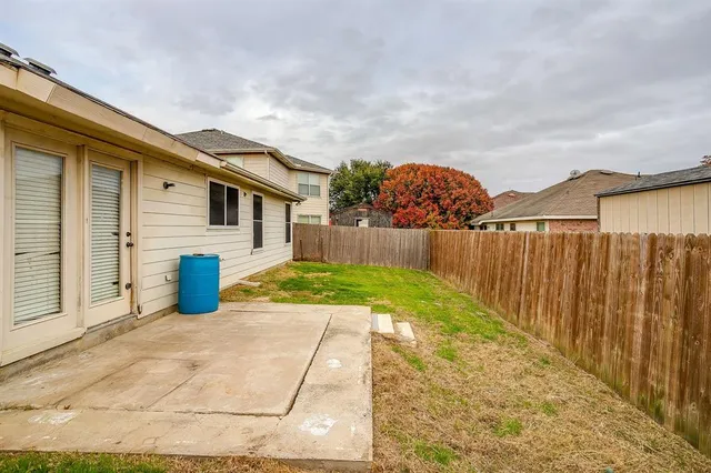 a view of backyard of house