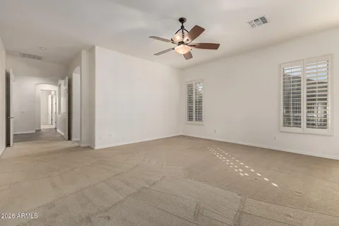 a view of empty room with windows