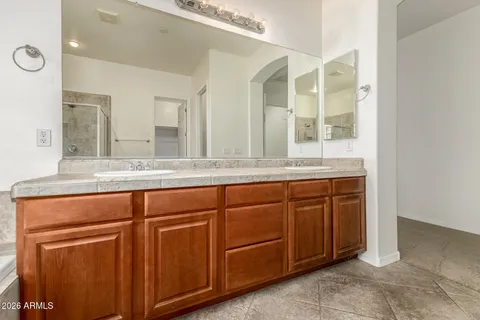 a bathroom with a shower and a bathtub
