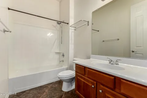 an empty room with fan