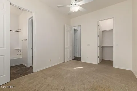 a view of storage and utility room with washer and dryer