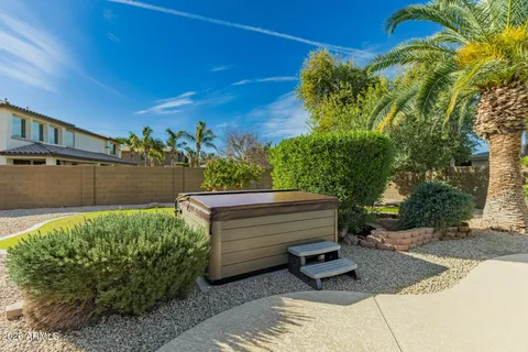 a view of park with large trees