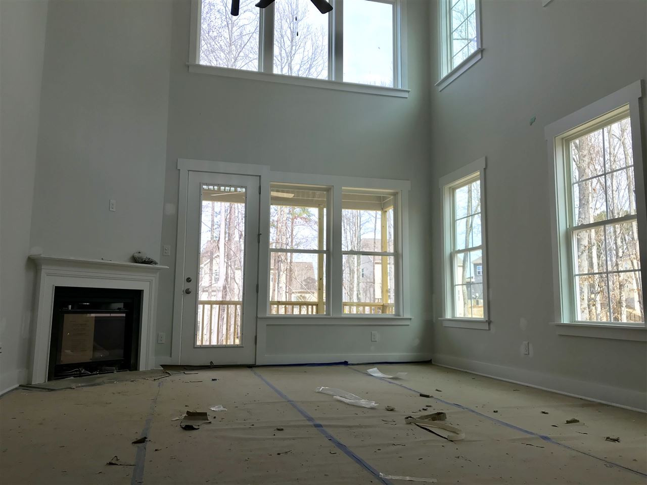 2516 Rambling Creek Road, Unit 28 Apex, NC 27523 - Photo 6 of 29 2 Story family room with several windows for great natural light. Family Room