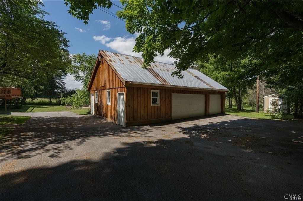 27317 5 Corners Road Le Ray, NY 13616 - Photo 15 of 16 3 car garage w/storage above