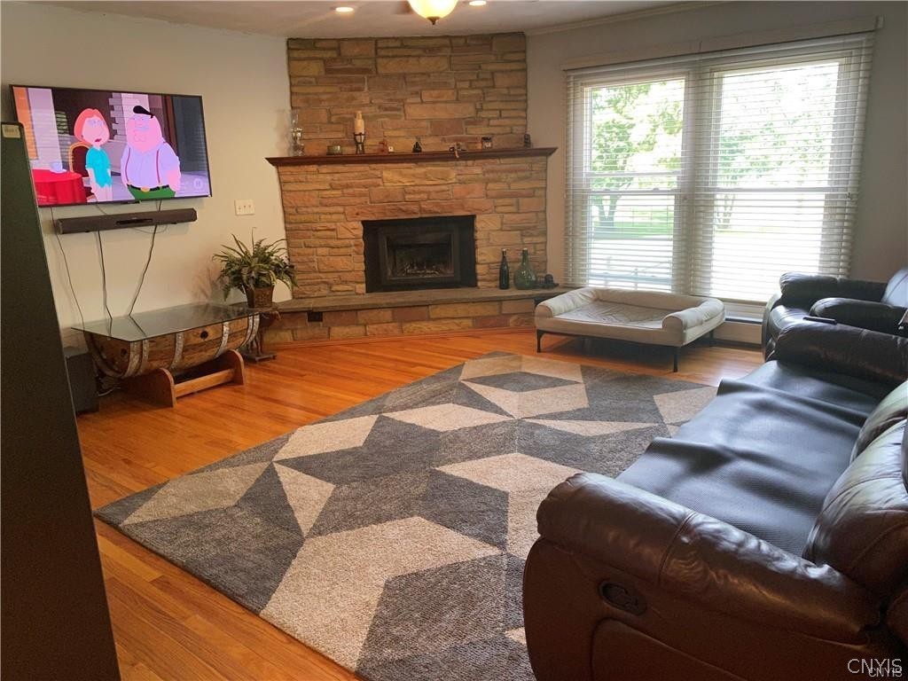 27317 5 Corners Road Le Ray, NY 13616 - Photo 3 of 16 Livingroom w/woodburning fireplace