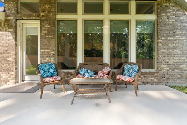 a outdoor living space with furniture and a window