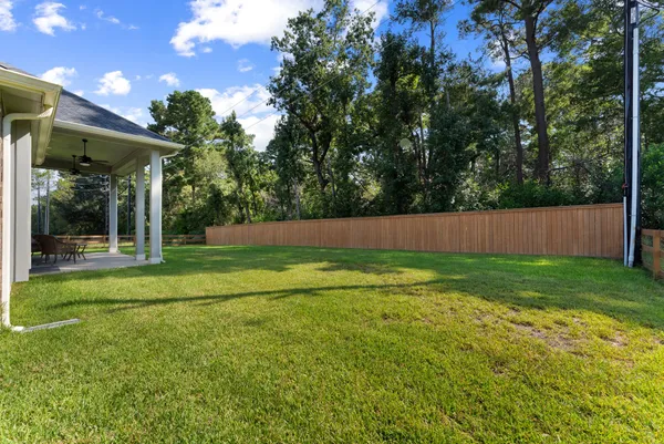a view of backyard with green space