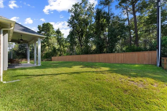 a view of backyard with green space