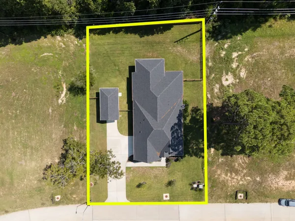 a view of outdoor space with signage and flags