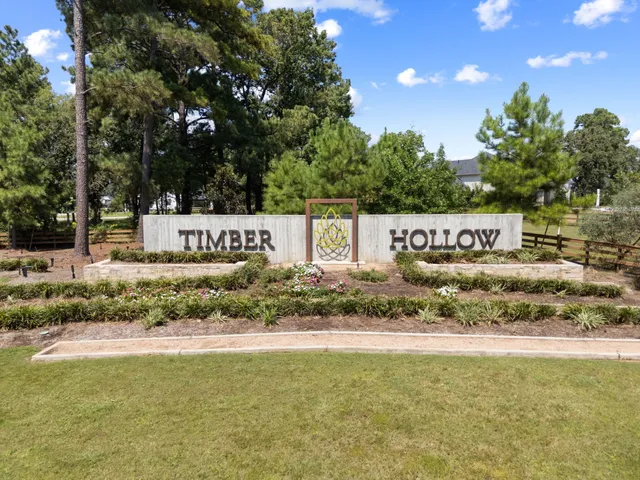 a view of a swimming pool with a balcony