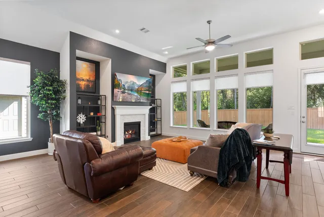 a spacious bedroom with a large bed and a large window