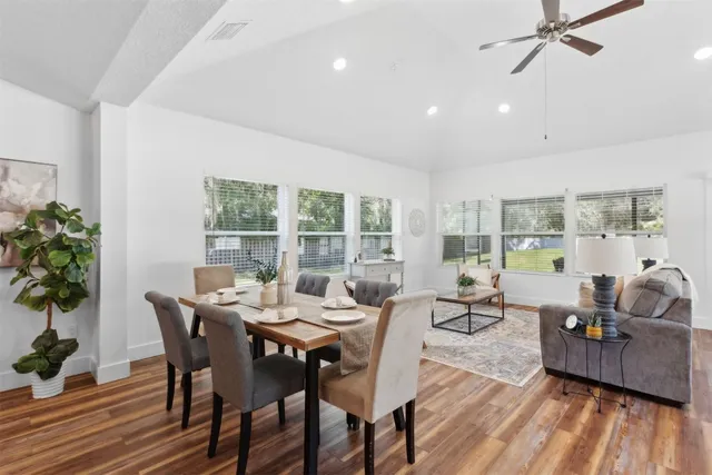 a view of a kitchen with furniture and window in the kitchen