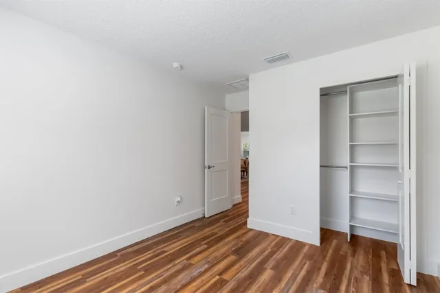 a view of a swimming pool with an outdoor seating