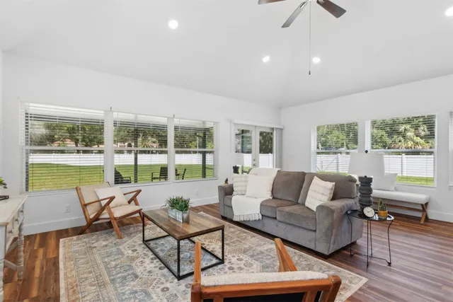 a front view of house with yard and green space