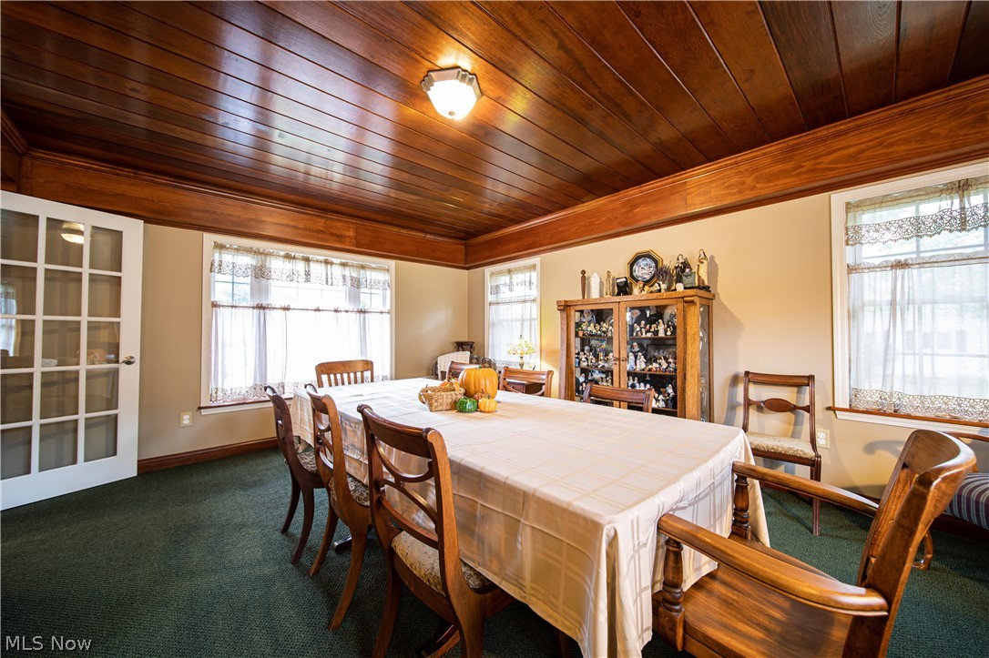 225 Fairfield Road Painesville, OH 44077 - Photo 4 of 29 Formal dining room has knotty pine ceiling.
