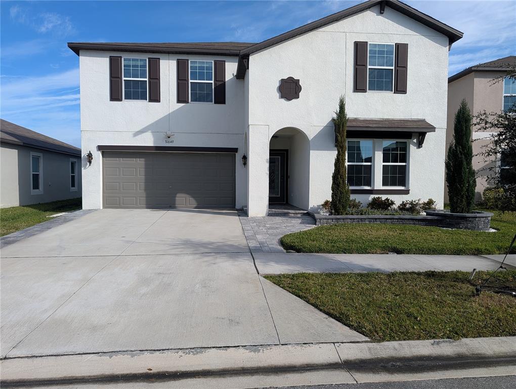 31649 Sun Kettle Loop Wesley Chapel, FL 33545 - Photo 1 of 74
