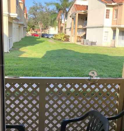 a view of a glass door of the house