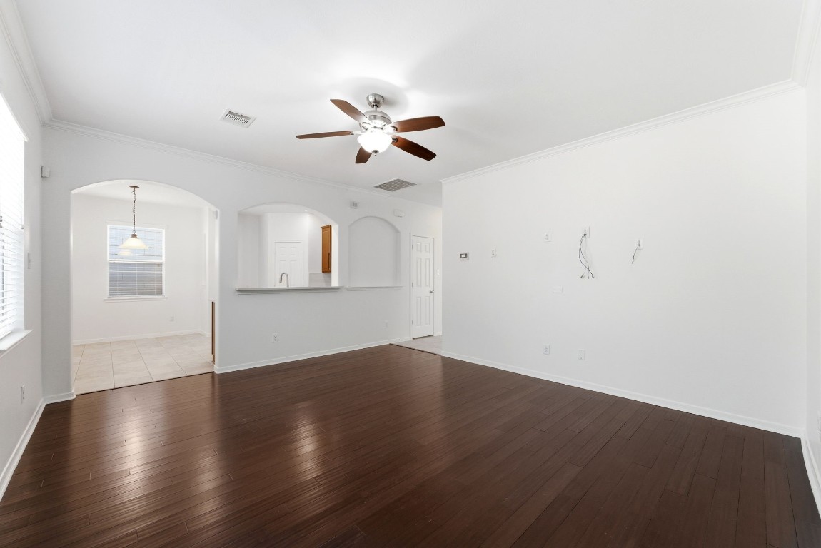 6407 Wilshire Ridge Houston, TX 77040 - Photo 14 of 37 wooden floor in an empty room with a window