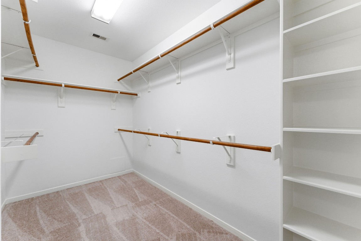 6407 Wilshire Ridge Houston, TX 77040 - Photo 25 of 37 a view of an empty walk in closet