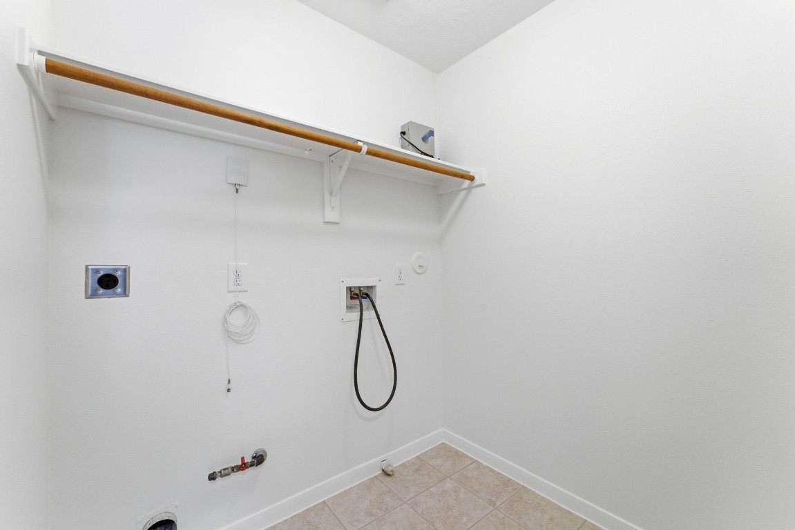 6407 Wilshire Ridge Houston, TX 77040 - Photo 26 of 37 a bathroom with a glass shower door