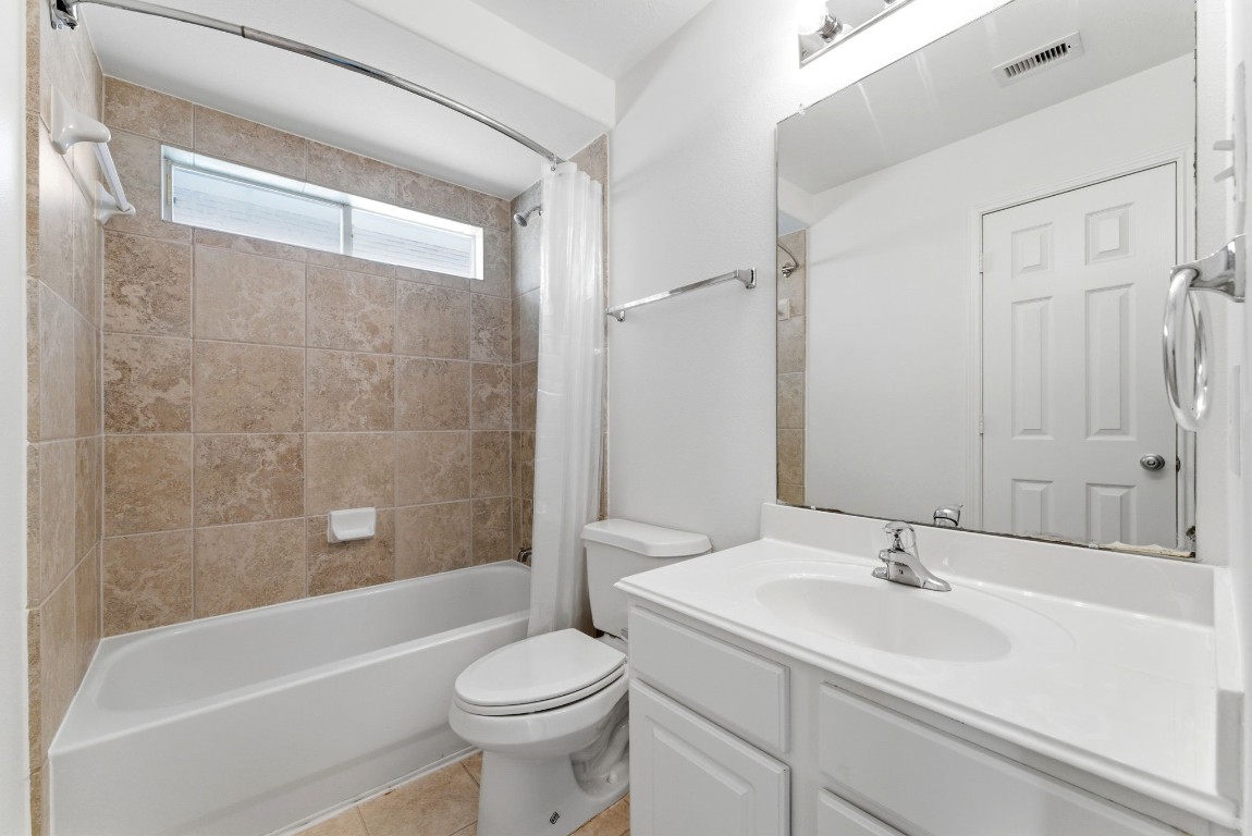 6407 Wilshire Ridge Houston, TX 77040 - Photo 27 of 37 a bathroom with a sink toilet and shower