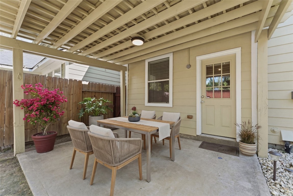 6407 Wilshire Ridge Houston, TX 77040 - Photo 36 of 37 a view of a patio with table and chairs and potted plants