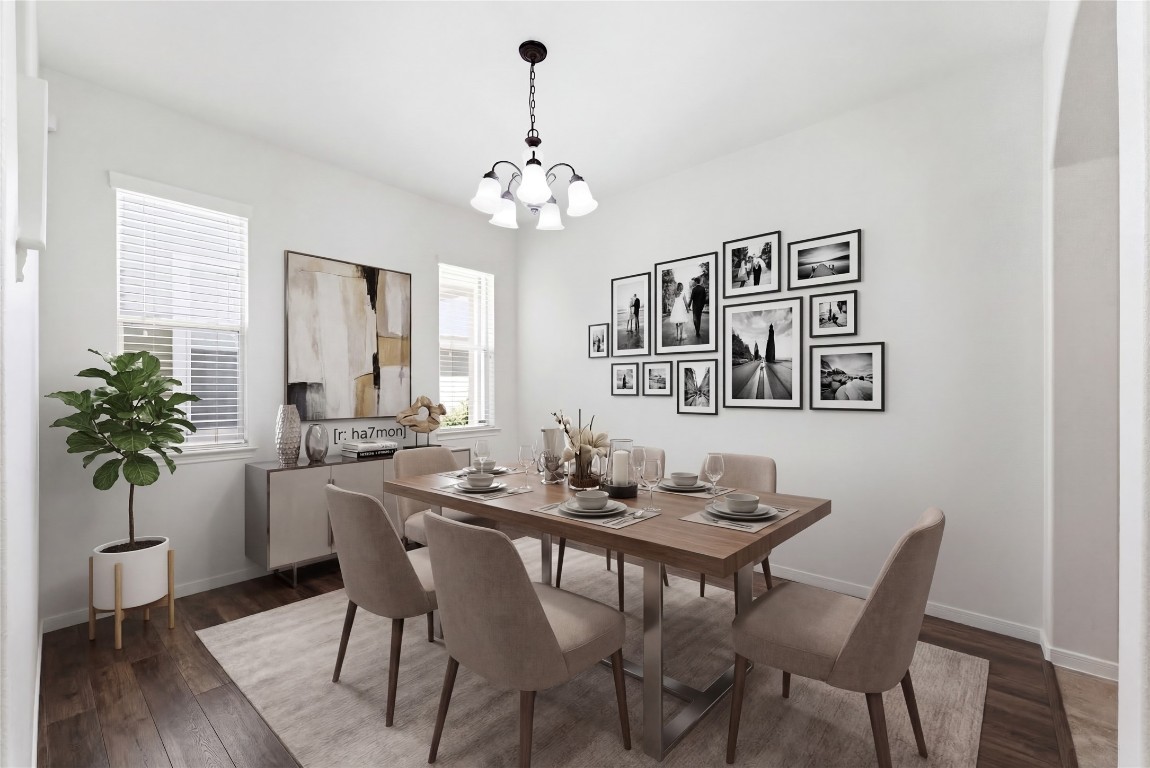 6407 Wilshire Ridge Houston, TX 77040 - Photo 5 of 37 a view of a dining room with furniture wooden floor and chandelier