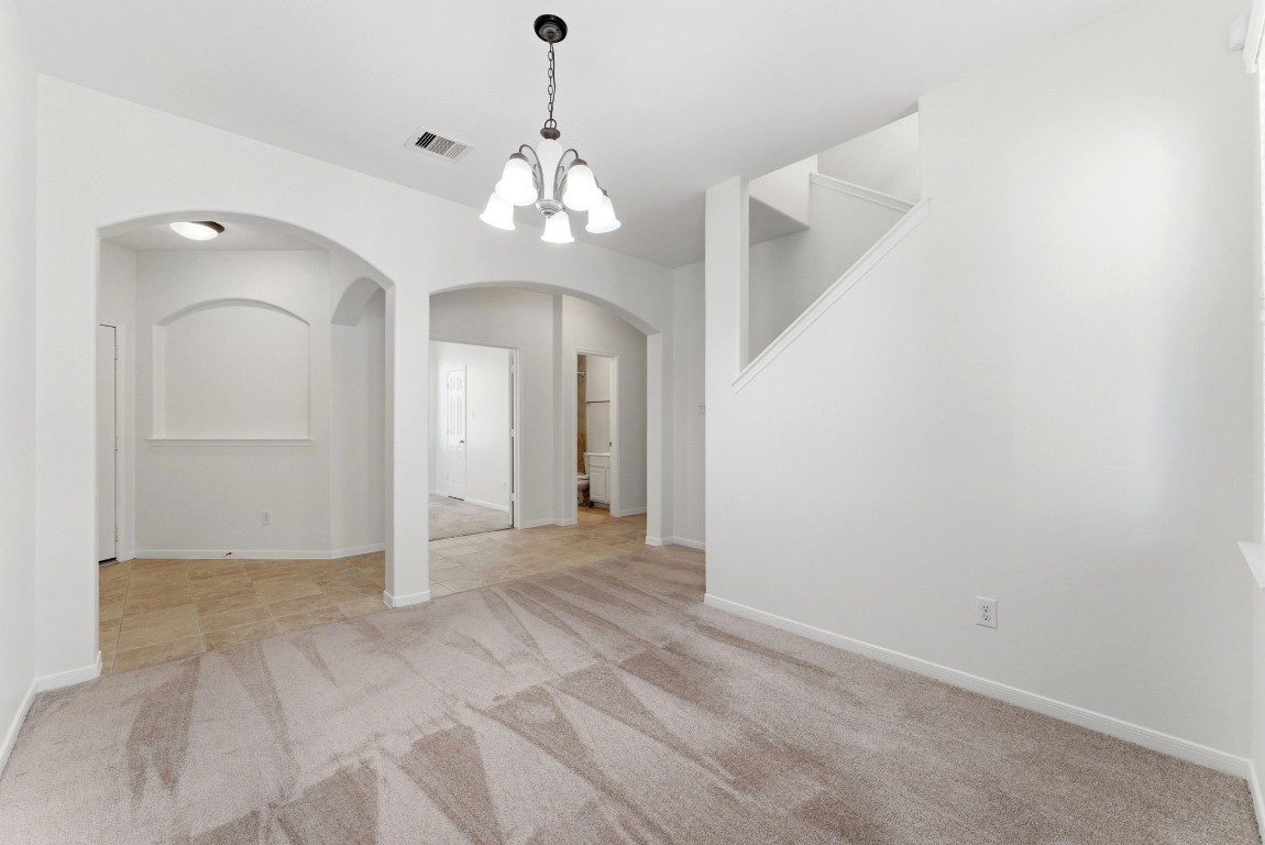 6407 Wilshire Ridge Houston, TX 77040 - Photo 6 of 37 a view of a chandelier in big room and chandelier