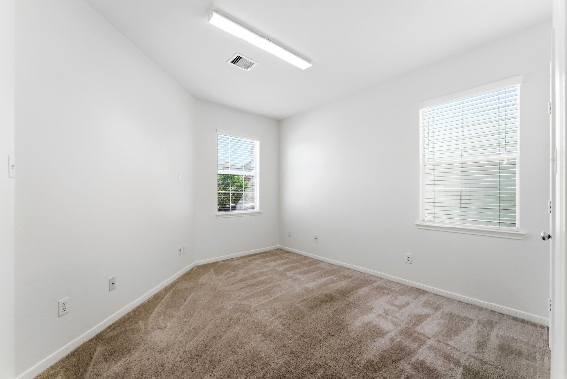 6407 Wilshire Ridge Houston, TX 77040 - Photo 8 of 37 an empty room with a window