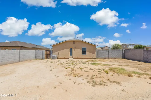 a bathroom with a sink mirror and vanity