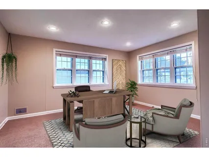 a workspace with furniture and window