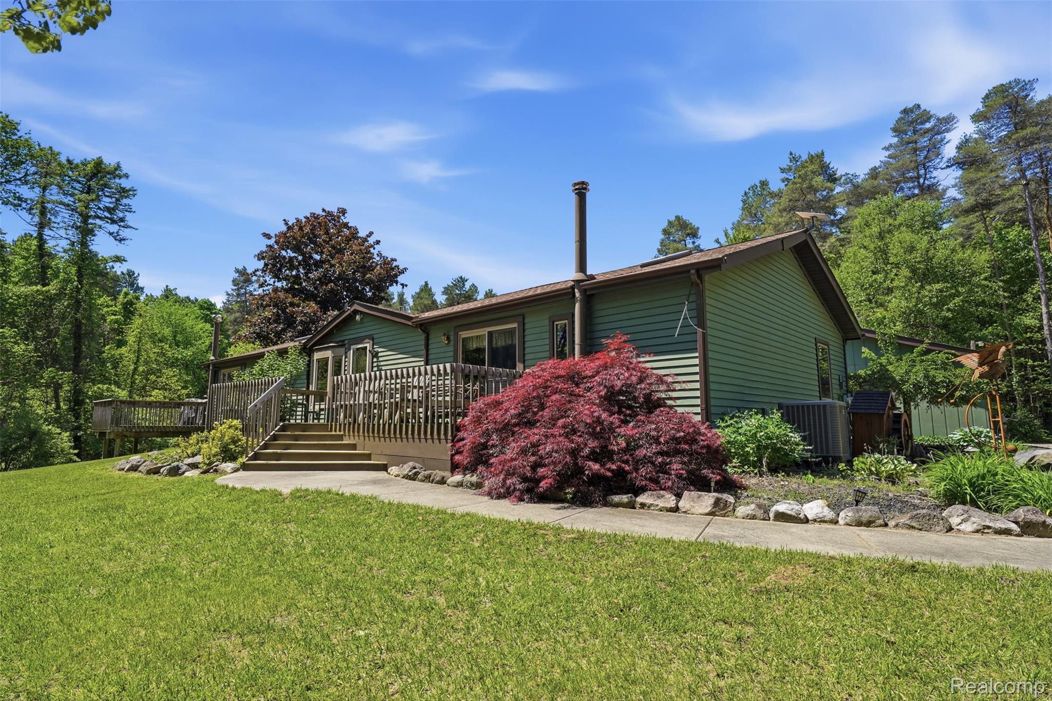 3167 Roods Lake Road Lapeer, MI 48446 - Photo 2 of 38 Beautifully landscaped yard.