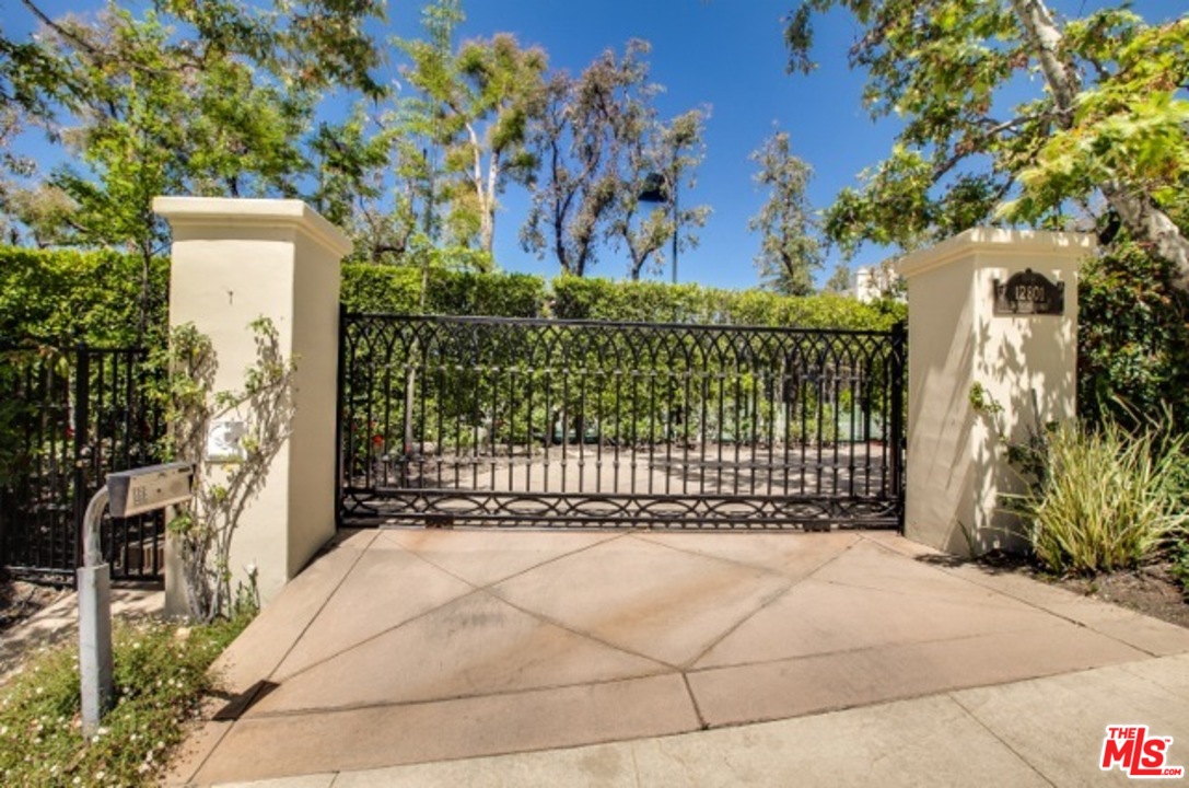 12801 Chalon Road Los Angeles, CA 90049 - Photo 5 of 16 a view of a wrought iron fence