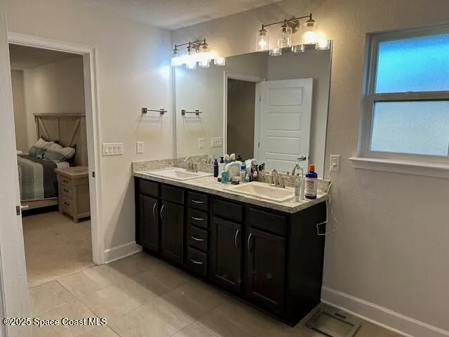 a spacious bedroom with a bed and a window