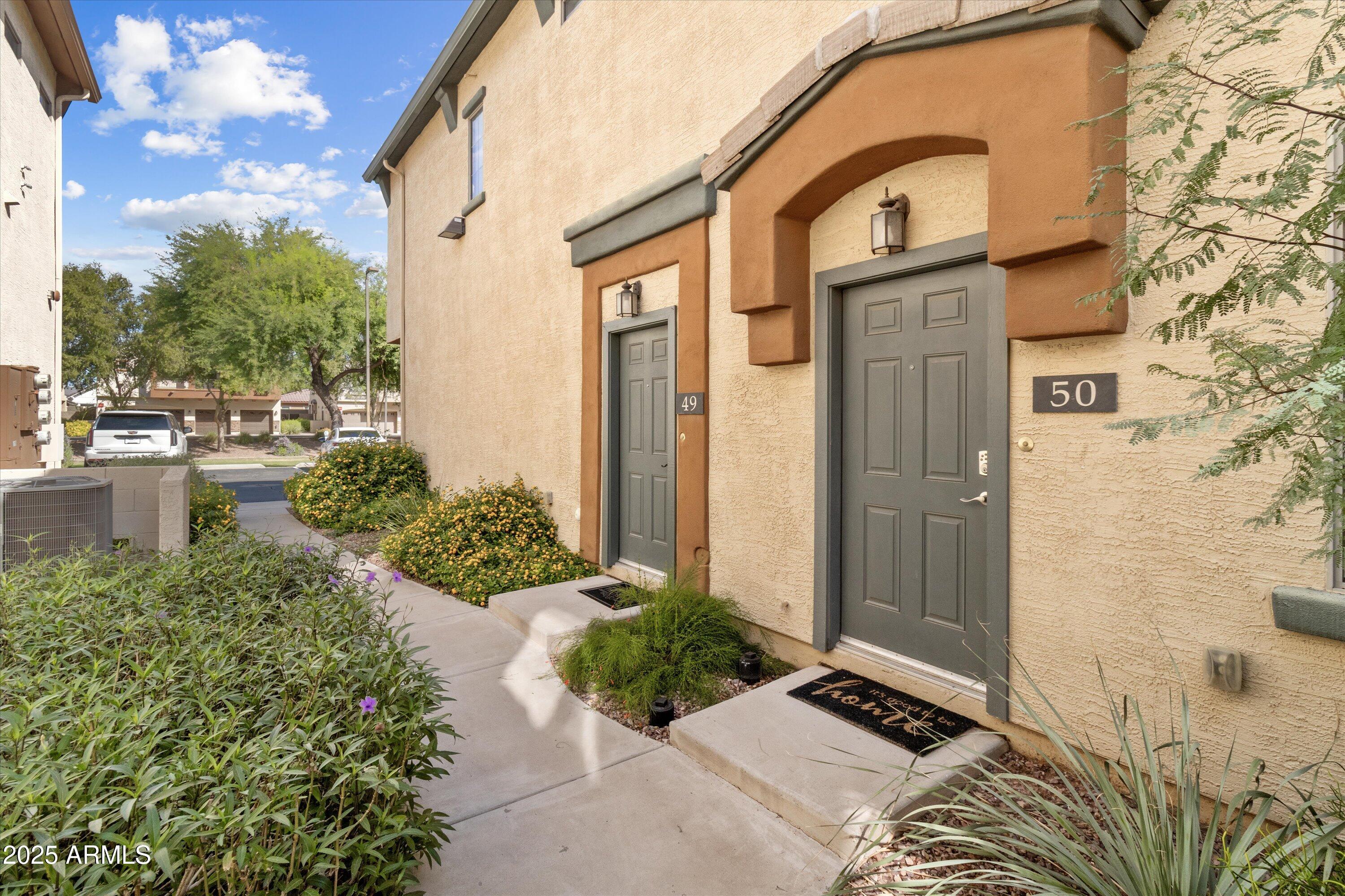 2727 North Price Road, Unit 50 Chandler, AZ 85224 - Photo 2 of 32 a view of balcony with patio