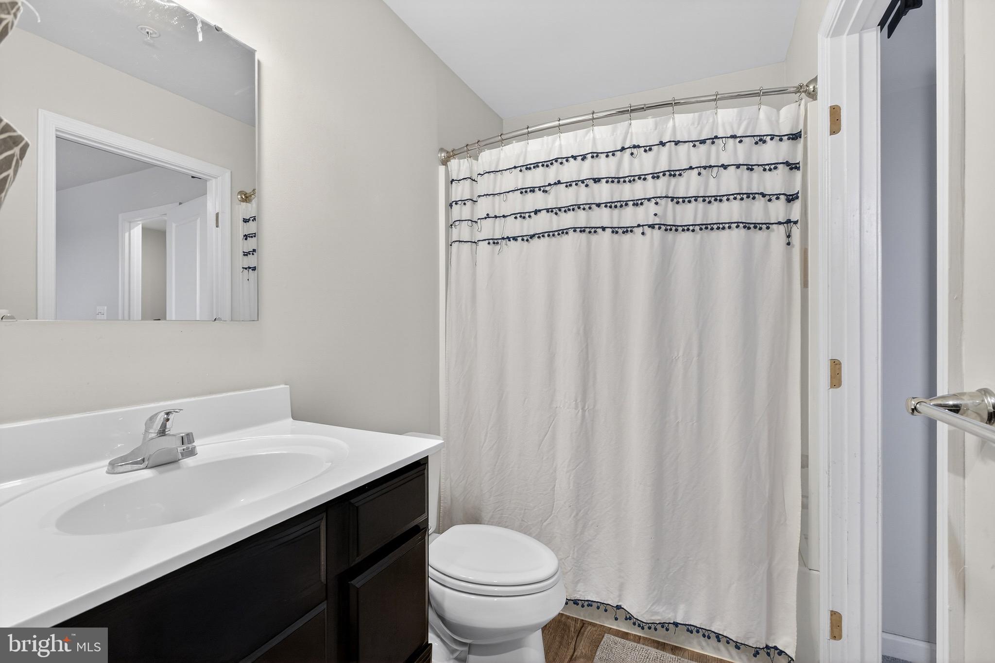 34 Blackgum Road Elkton, MD 21921 - Photo 19 of 37 a bathroom with a sink a toilet and a mirror
