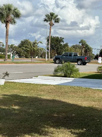 a view of a fountain with a big yard