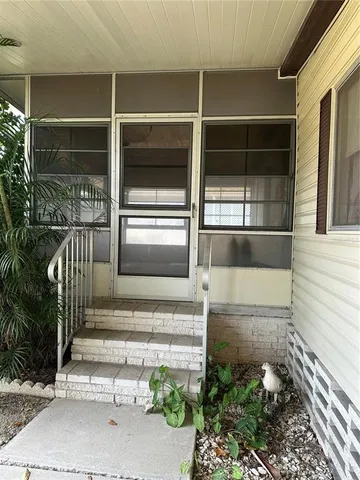 a front view of a house with a garage