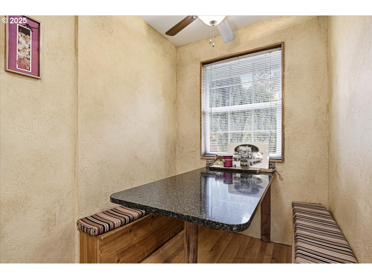 1820 Southwest Heiney Road Gresham, OR 97080 - Photo 16 of 48 a table and chairs in front of a door